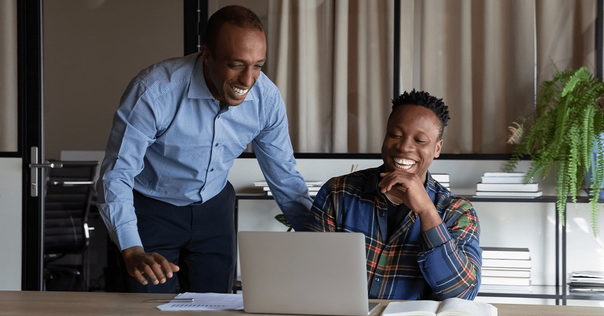 Mentor helping a mentee start a career in cybersecurity.